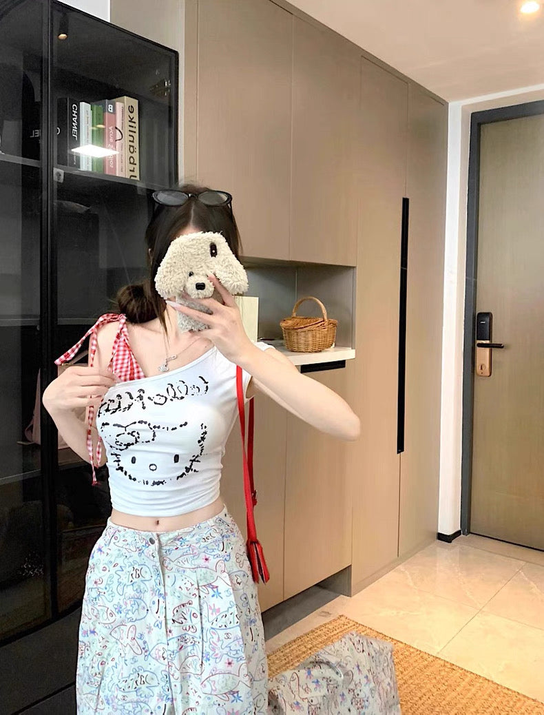 Kitty Side Tie Sleeveless Top