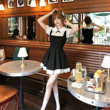 Uni White Puff Sleeve Black Dress