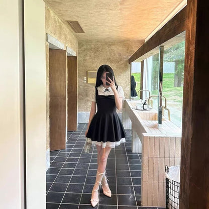 Uni White Puff Sleeve Black Dress