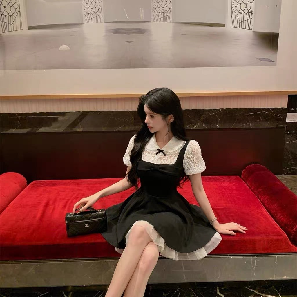 Uni White Puff Sleeve Black Dress