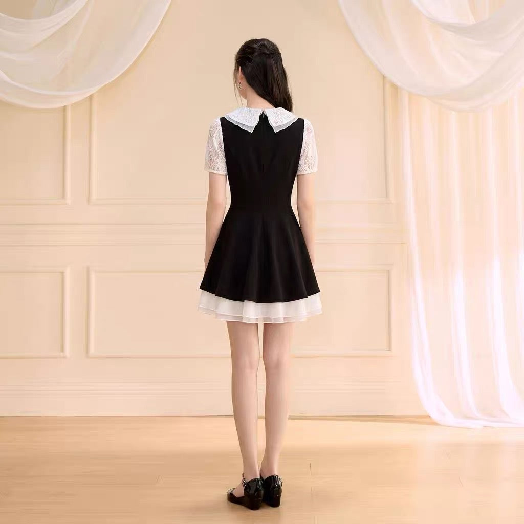 Uni White Puff Sleeve Black Dress